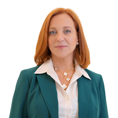 Professional headshot of attorney Jacqui Calderin wearing a green blazer over a white blouse, facing forward against a light background.